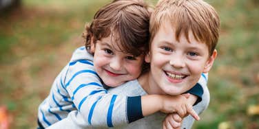 young siblings from a working class family spending time together