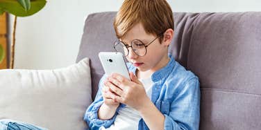 young child being entertained by ChatGPT