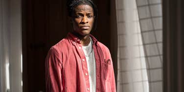 serious young man looking at camera