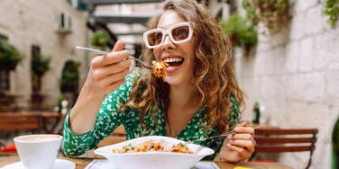 Woman eating her favorite flavor food revealing her personality