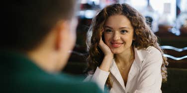 woman answering a first date question that reveals what the relationship will be like