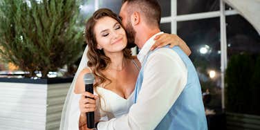 bride giving a speech at her wedding