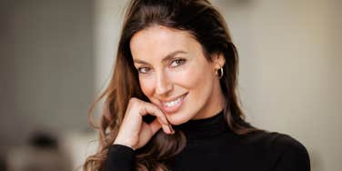 brilliant frugal woman smiling happily