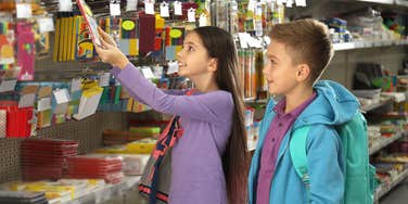 children buying school supplies