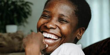 Deeply likable person smiling. 