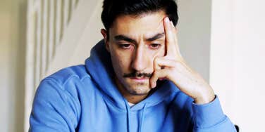 Deeply unhappy husband.