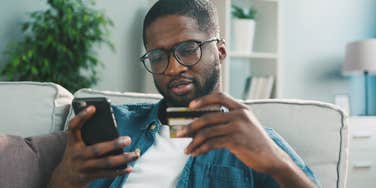 Man Exhibiting Financial Red Flags That Actually Show Someone Is A Keeper