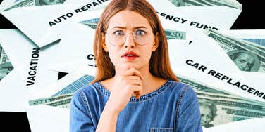 woman concerned about pitfalls of cash stuffing envelope budgeting