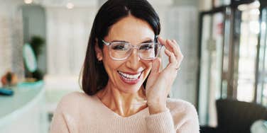 classy woman smiling in her home