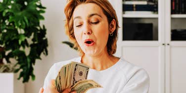 Person making money.