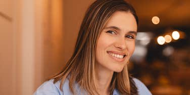 happy woman living her life despite being lonely