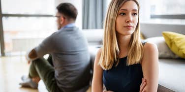 unhappy couple appearing distant and headed for divorce