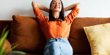 lazy woman relaxing on her couch