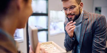man wonders propose engagement ring small