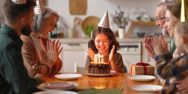 little girl celebrating at birthday party