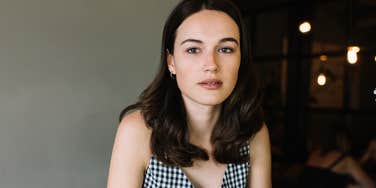 frugal professional woman thinking about money lessons from parents