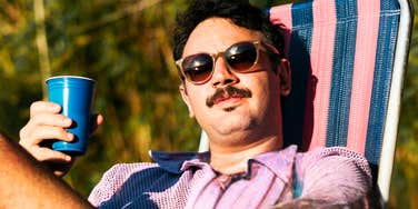 Man who is way more relaxed than everyone else. 