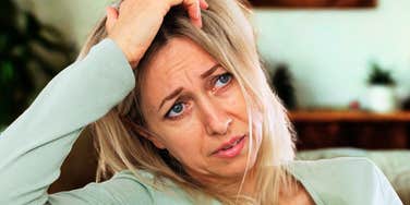Woman realizing she has outgrown the person she once loved. 