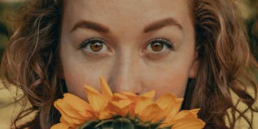 Woman stares into eyes.