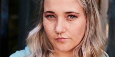 young gen z woman looking annoyed