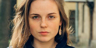 sad stressed woman unable to afford necessities 