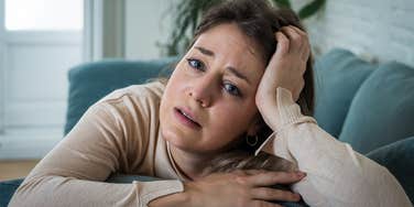 sad middle class woman thinking shes a failure