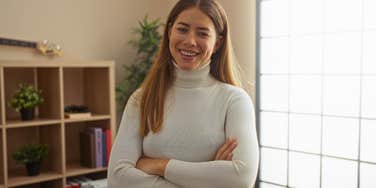 frugal woman smiling after saving money
