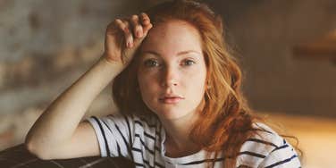 uncomfortable young woman avoiding financial advice