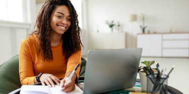 woman with healthy work-life balance working from home
