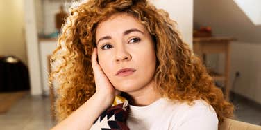 Woman who is on a emotional rollercoaster in a affair with a married man.