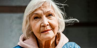 Woman in her seventies.
