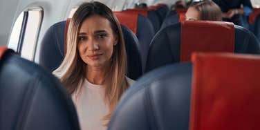 woman sitting highly coveted seat plane worst