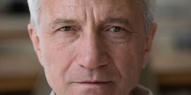 older man looking sad struggling with mental health