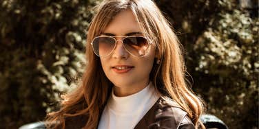 fashionable woman unworried about financial struggles