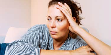Woman who is mentally exhausted and considering divorce. 