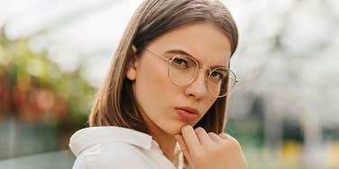 manipulative woman looking suspicious