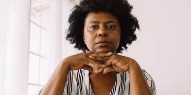 unhappy older woman thinking about the future