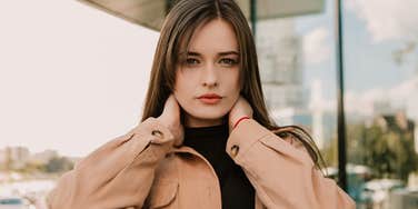suspicious woman who doesnt like others but is staying silent