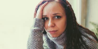 anxious woman suffering from poor mental health