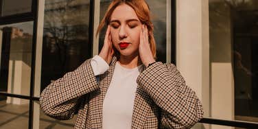 woman realizing she's making herself less intelligent