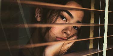Wife who radiates unhappiness.