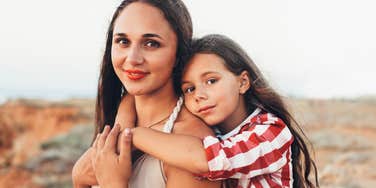 Child with strong mother.