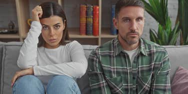 upset couple whose relationship is in trouble turned away from one another