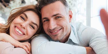 happy couple with healthy communication habits smiling