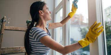 woman cleaning house day week impacts money flow