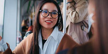 woman telling stranger on bus theyre boring