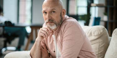 dejected man thinking about his troubled marriage