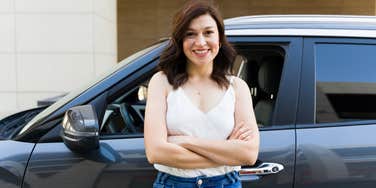mom standing by car left overnight at a bar