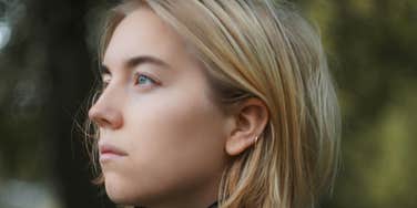 Anxious woman overthinks in relationship.