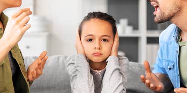 Child in the middle of parents breakup. 